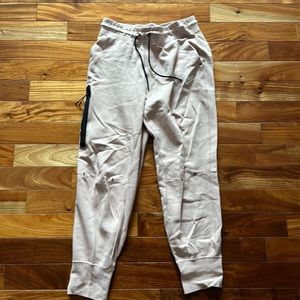 Women's pink nike tech pants size medium